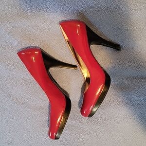 Burgandy‐Red Alfani "Maddy" pumps.